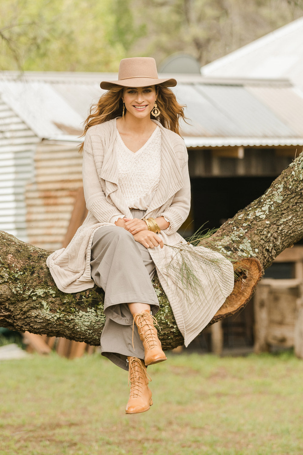 Model Ilona wearing size S of the Starlit Night Cotton Cardi in colour Latte, from the front, showing the whole outfit