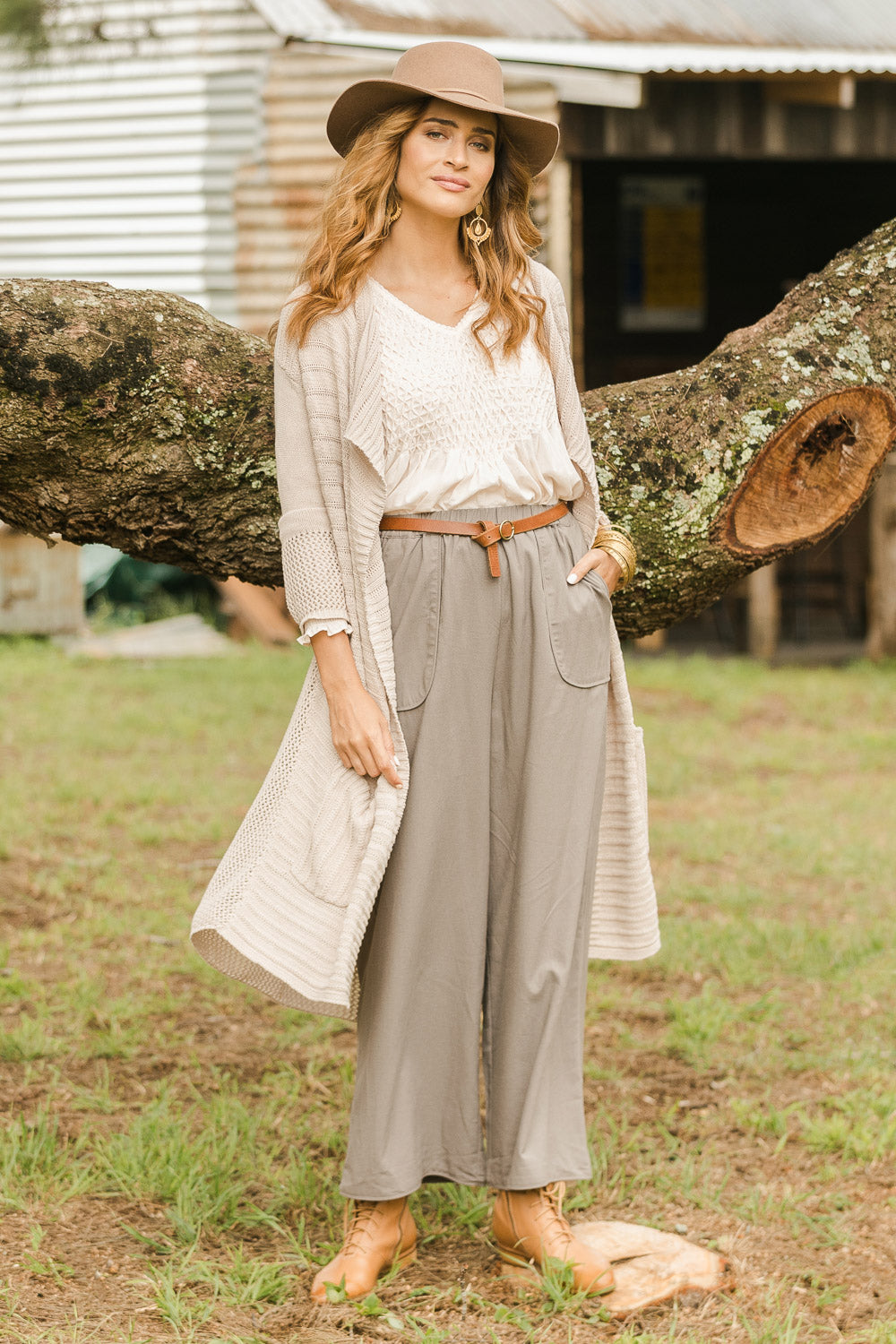 Model Ilona wearing size S of the Starlit Night Cotton Cardi in colour Latte, from the front, showing the whole outfit