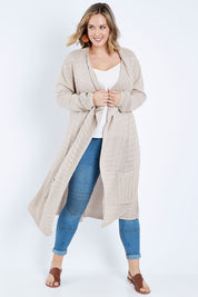 Model Jess wearing size L of the Starlit Night Cotton Cardi in colour Latte, from the front, showing the whole outfit