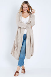 Model Jess wearing size L of the Starlit Night Cotton Cardi in colour Latte, from the front, showing the whole outfit