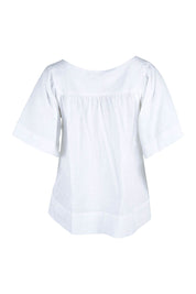 Product shot of the Freya Top in colour White (White), from the back