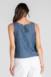 A model wearing the Hara Cotton Top in colour Chambray (Blue), from the back
