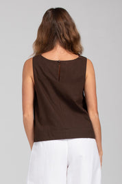 A model wearing the Hara Cotton Top in colour Coffee, from the back
