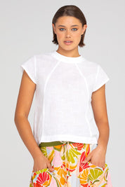 A model wearing the Leaf Cotton Top in colour White (White), from the front, cropped image