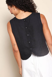 Model Pamelar wearing size 10 of the Rose Linen Top - Black in colour Black, from the back