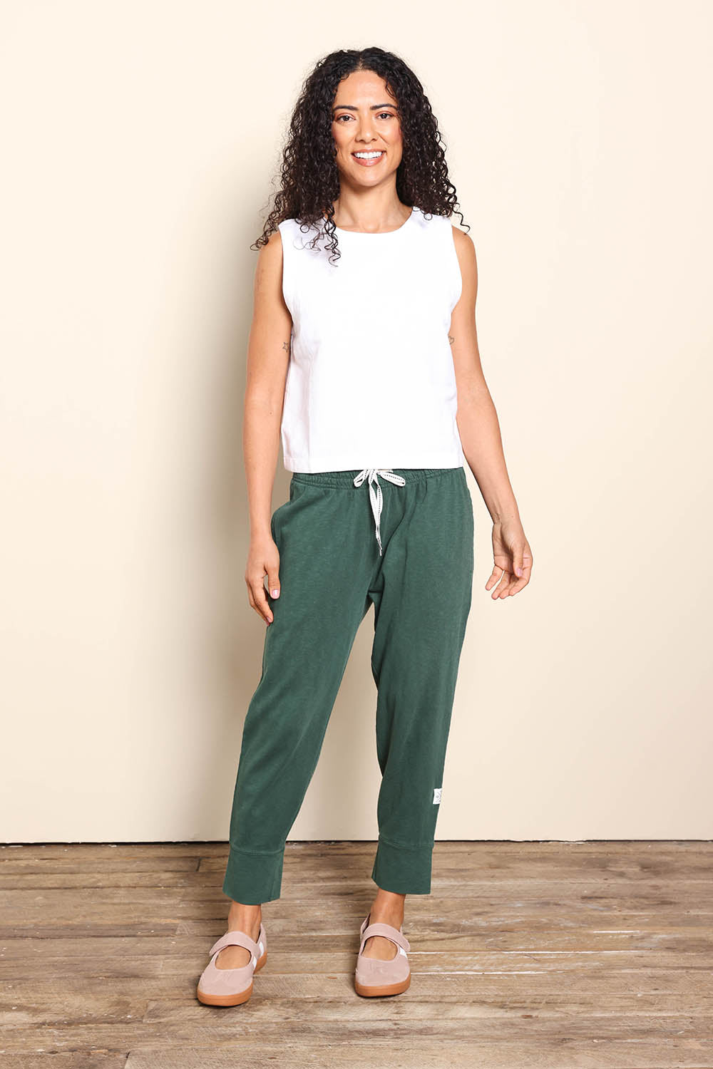 Model Pamelar wearing size 10 of the Rose Linen Top - White in colour White, from the front