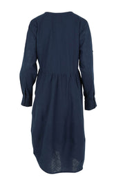 Product shot of the Guru Cotton Dress in colour Navy (Blue), from the back