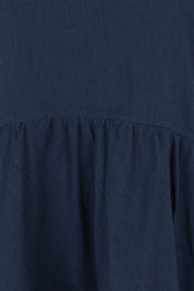 Product shot of the Guru Cotton Dress in colour Navy (Blue), detail