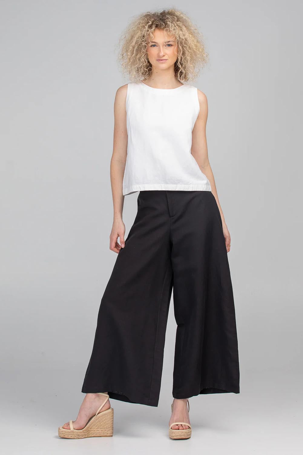 A model wearing the Jedda Linen Cotton Pant in colour Black (Black), from the front, showing the whole outfit