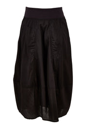 Product shot of the Guru Skirt in colour Black (Black), from the back