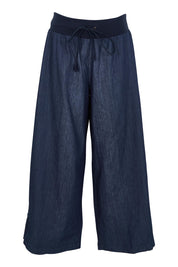 Product shot of the Ria Denim Pant in colour Darkdenim (Blue), from the front