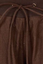 Product shot of the Guru Pant in colour Coffee, detail