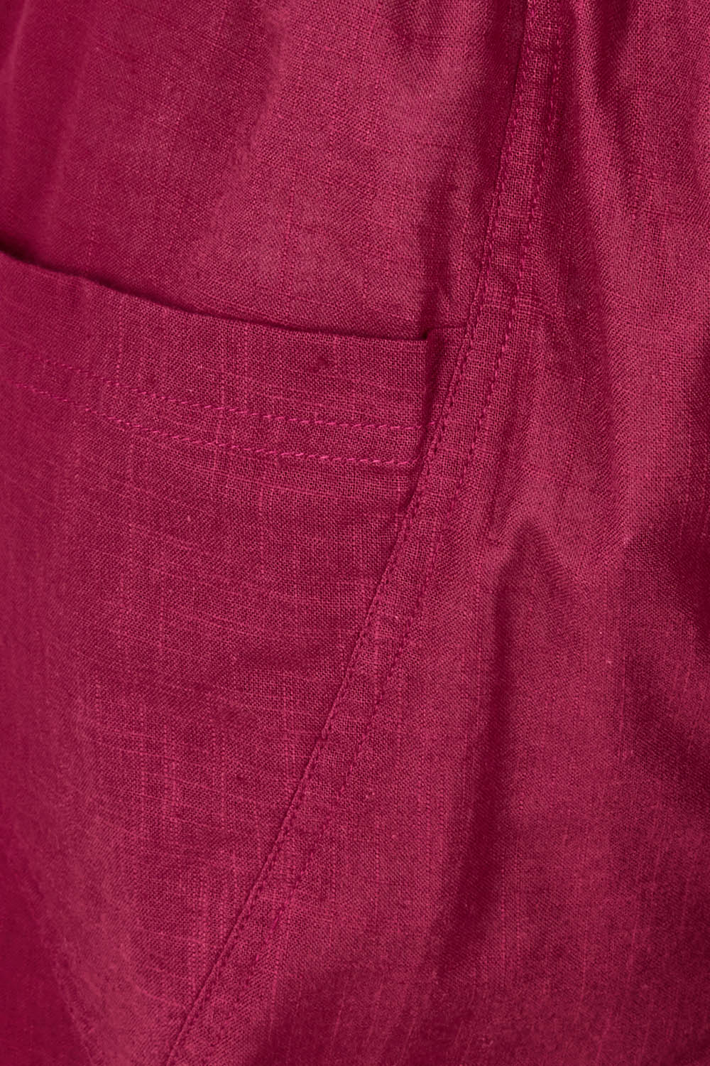 Product shot of the Guru Pant in colour Magenta (Purple), detail