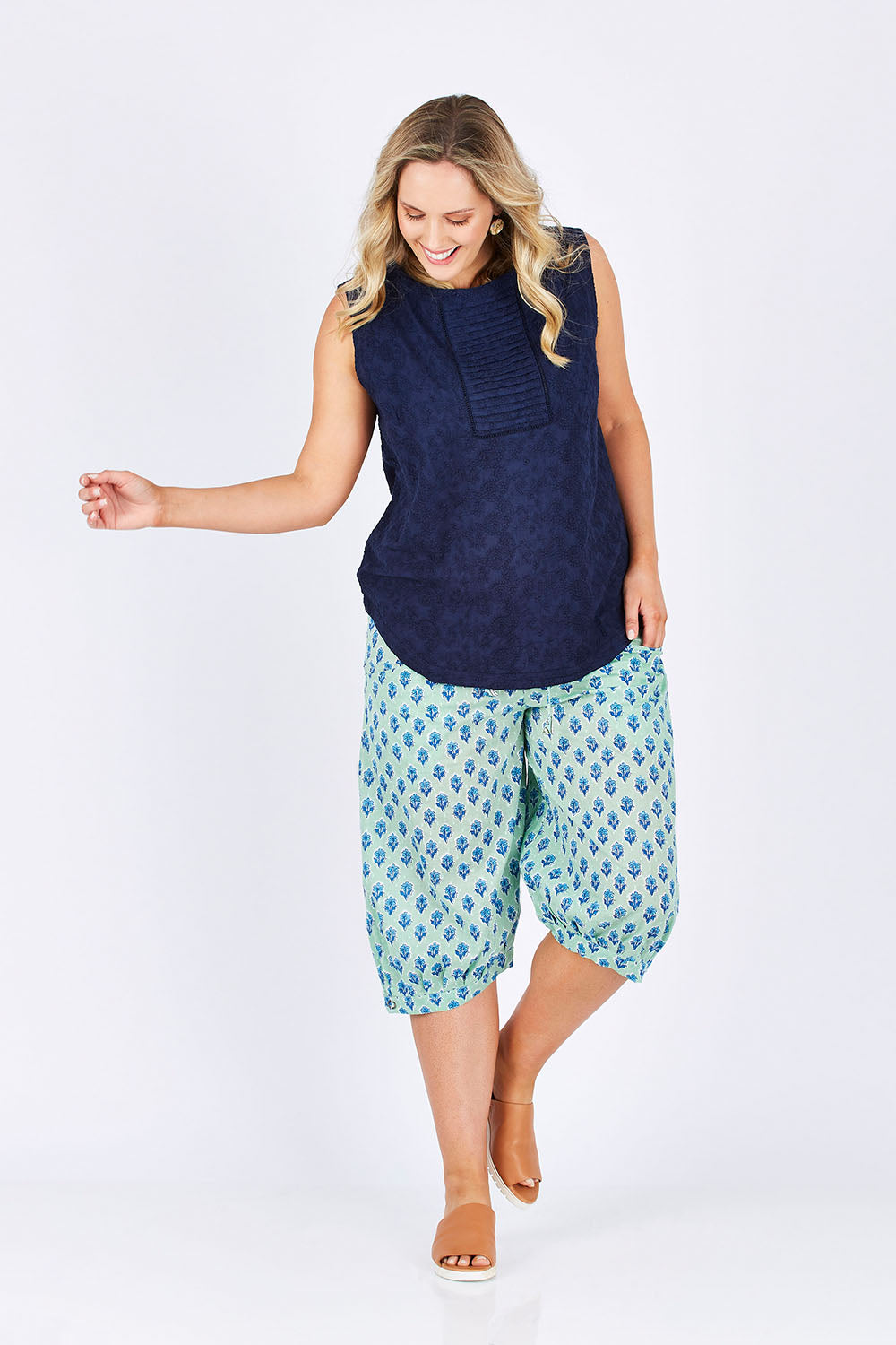 Model Jess wearing size 14 of the Jada Short in colour Mint (Blue), from the front, showing the whole outfit