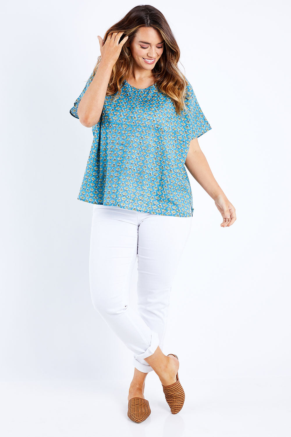 Model Laura wearing size 14 of the Alora Top in colour Bananaflow (Blue), from the front, showing the whole outfit