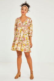Model Olivia wearing size 10 of the Aurelia Dress in colour Aurelia (Pink), from the front, showing the whole outfit