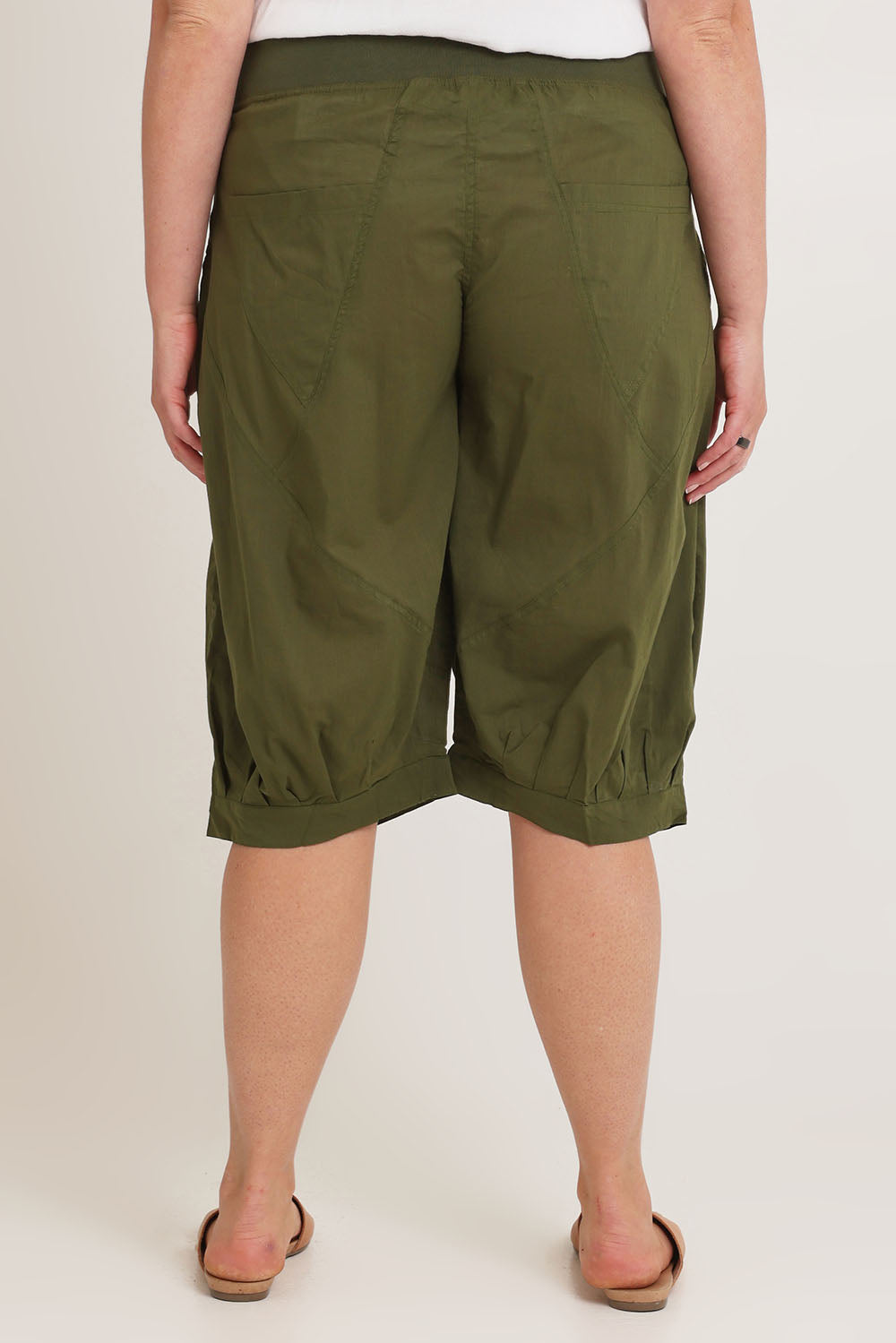 Model Chanel wearing size 16 of the Jada Short in colour Khaki (Green), from the back