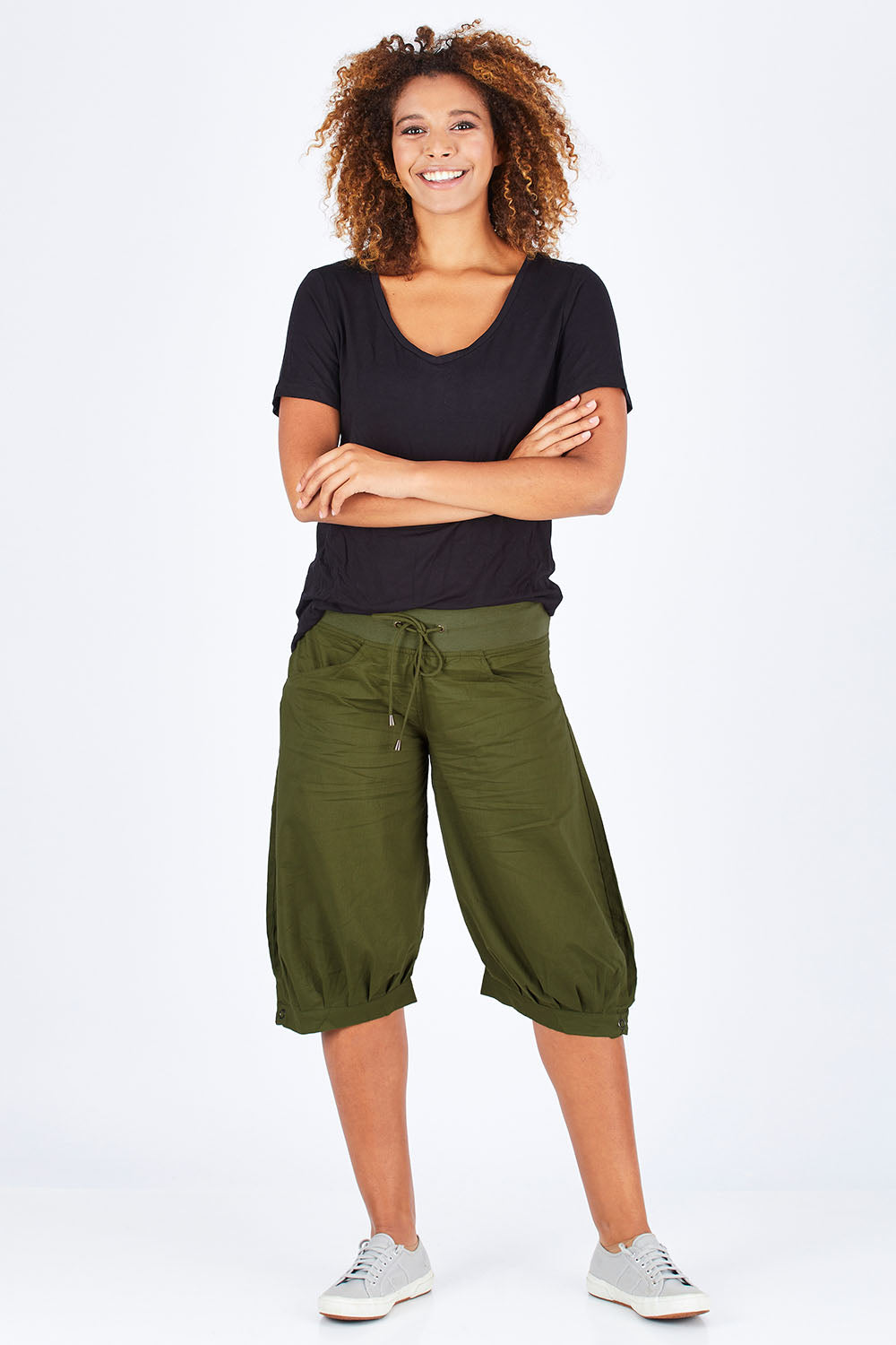 Model Summer wearing size 10 of the Jada Short in colour Khaki (Green), from the front, showing the whole outfit