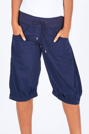 Model Summer wearing size 10 of the Jada Short in colour Navy (Blue), from the front, cropped image
