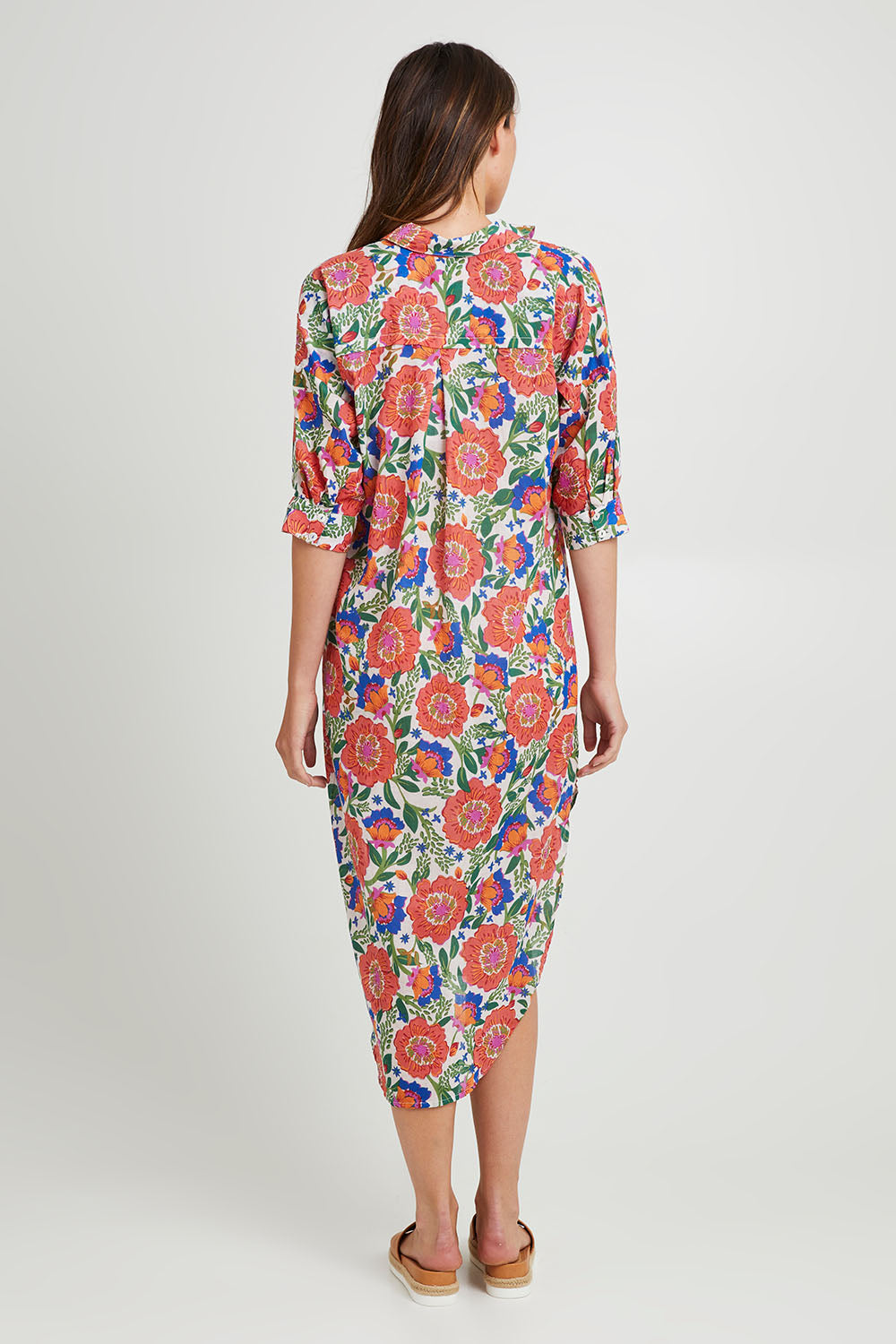 Model Madeline wearing size S of the Amari Shirt Dress in colour Whitegiul (White), from the back