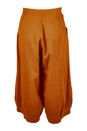 Product shot of the Zetta Pant in colour Mustard, from the back