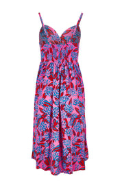 Product shot of the Ailana Dress in colour Ray (Pink), from the back