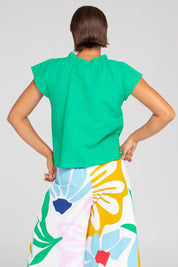 A model wearing the Sand Linen Cotton Top in colour Green (Green), from the back