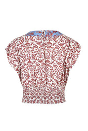Product shot of the Desi Cotton Top in colour Paradise, from the back
