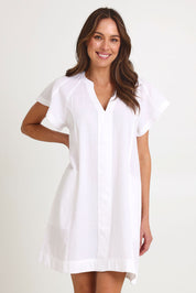 Model Madeline wearing size 10 of the Livy Cotton Dress in colour White (White), from the front, cropped image