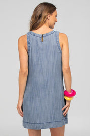 A model wearing the Mina Lyocell Dress in colour Comoda (Blue), from the back