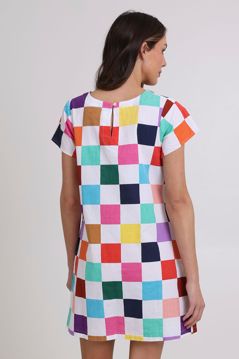 Model Madeline wearing size 10 of the Harper Cotton Dress in colour Gea, from the back