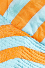 Product shot of the Fray Cotton Bucket Hat in colour Capripeach, detail