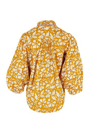 Product shot of the Pari Shirt in colour Mustard, from the back