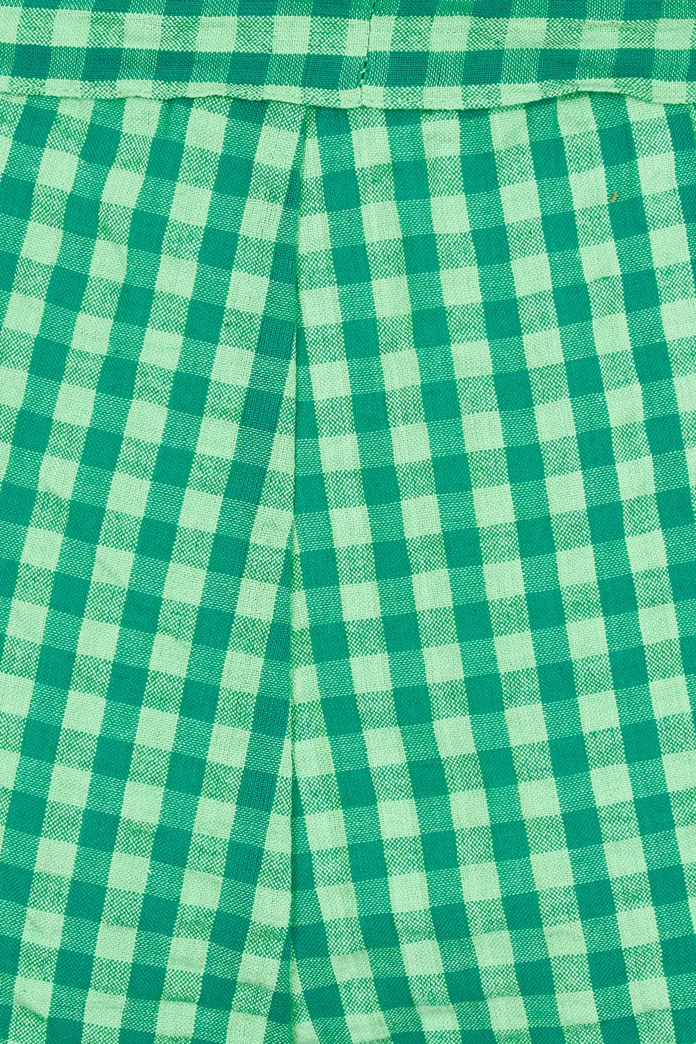 Product shot of the Hazel Cotton Short in colour Verde (Green), detail