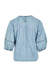 Product shot of the Ava Lyocell Top in colour Comoda (Blue), from the back