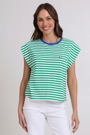 Model Madeline wearing size S of the Bellissimo Cotton Tee in colour Green (Green), from the front, cropped image