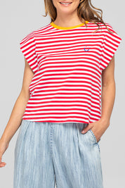 A model wearing the Bellissimo Cotton Tee in colour Redstripe (Red), from the front, cropped image