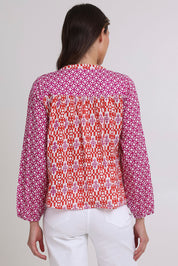 Model Madeline wearing size 10 of the Fleetwood Cotton Top in colour Naples (Pink), from the back