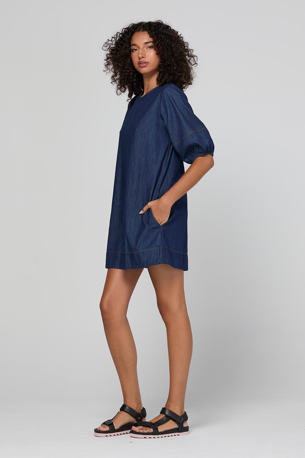Model Genericm wearing size sample of the Ava Dress – Darkdenim in colour Darkdenim, from the front