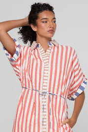 Model Genericm wearing size sample of the Maui Shirt Dress – Watermelon in colour Watermelon, from an angle