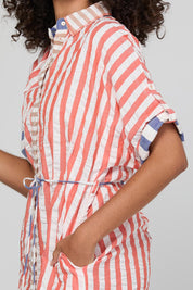 Model Genericm wearing size sample of the Maui Shirt Dress – Watermelon in colour Watermelon, from an angle