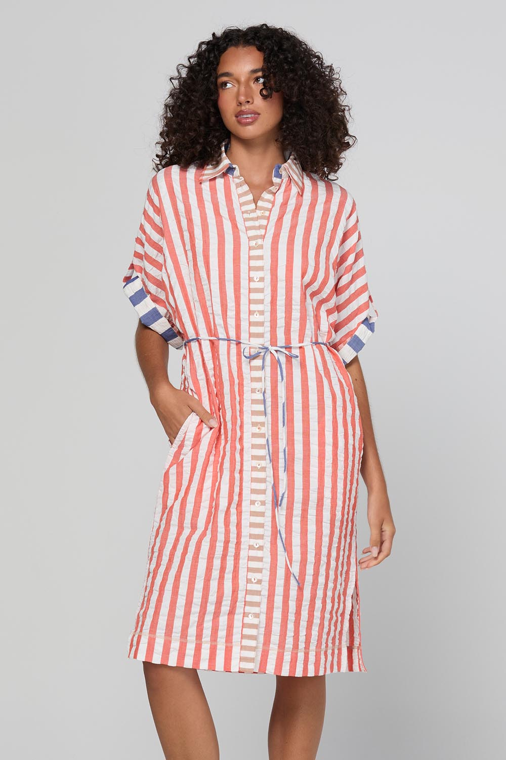 Model Genericm wearing size sample of the Maui Shirt Dress – Watermelon in colour Watermelon, in a cropped view