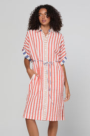 Model Genericm wearing size sample of the Maui Shirt Dress – Watermelon in colour Watermelon, in a cropped view