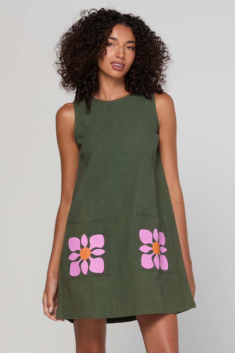Model Genericm wearing size sample of the Hana Dress – Cosmos in colour Cosmos, in a cropped view