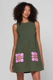 Model Genericm wearing size sample of the Hana Dress – Cosmos in colour Cosmos, in a cropped view