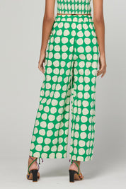 Model Genericm wearing size sample of the Carmen Pant - Circulo in colour Circulo, from the back