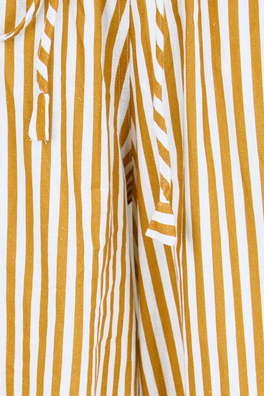 Product shot of the Guru Pant – Mustard in colour Mustard, showing detail