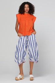 Model Genericm wearing size sample of the Guru Pant – Ocean in colour Ocean, from the front
