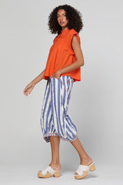 Model Genericm wearing size sample of the Guru Pant – Ocean in colour Ocean, from the front