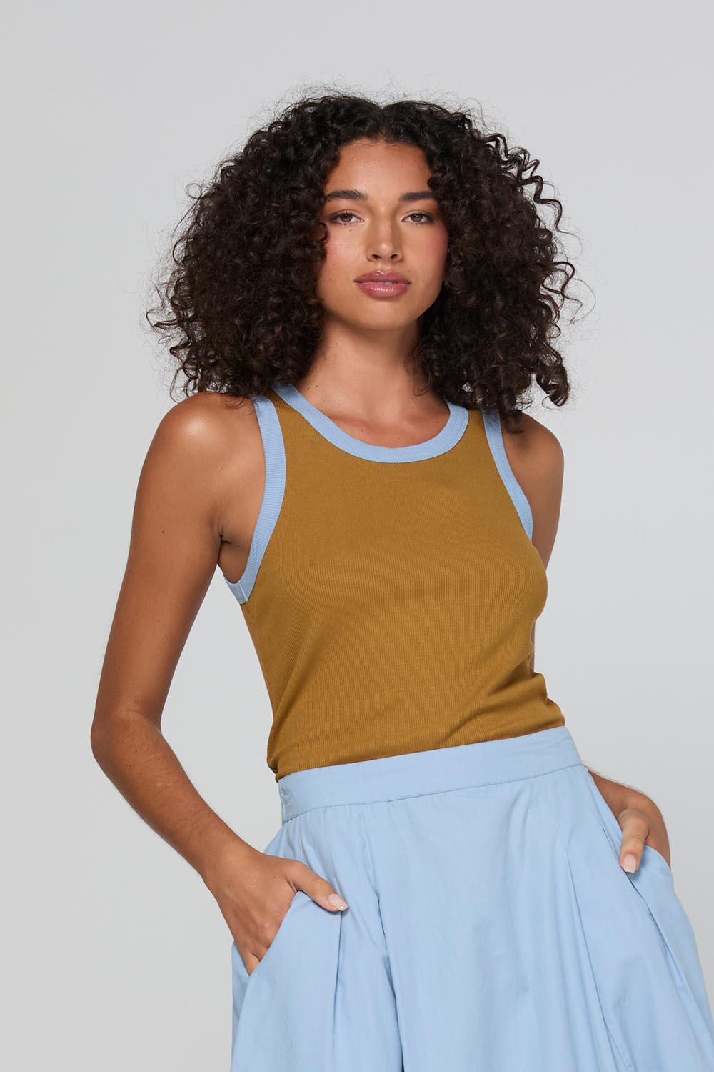 Model Genericm wearing size sample of the Bellissimo Tank – Icedchai in colour Icedchai, in a cropped view